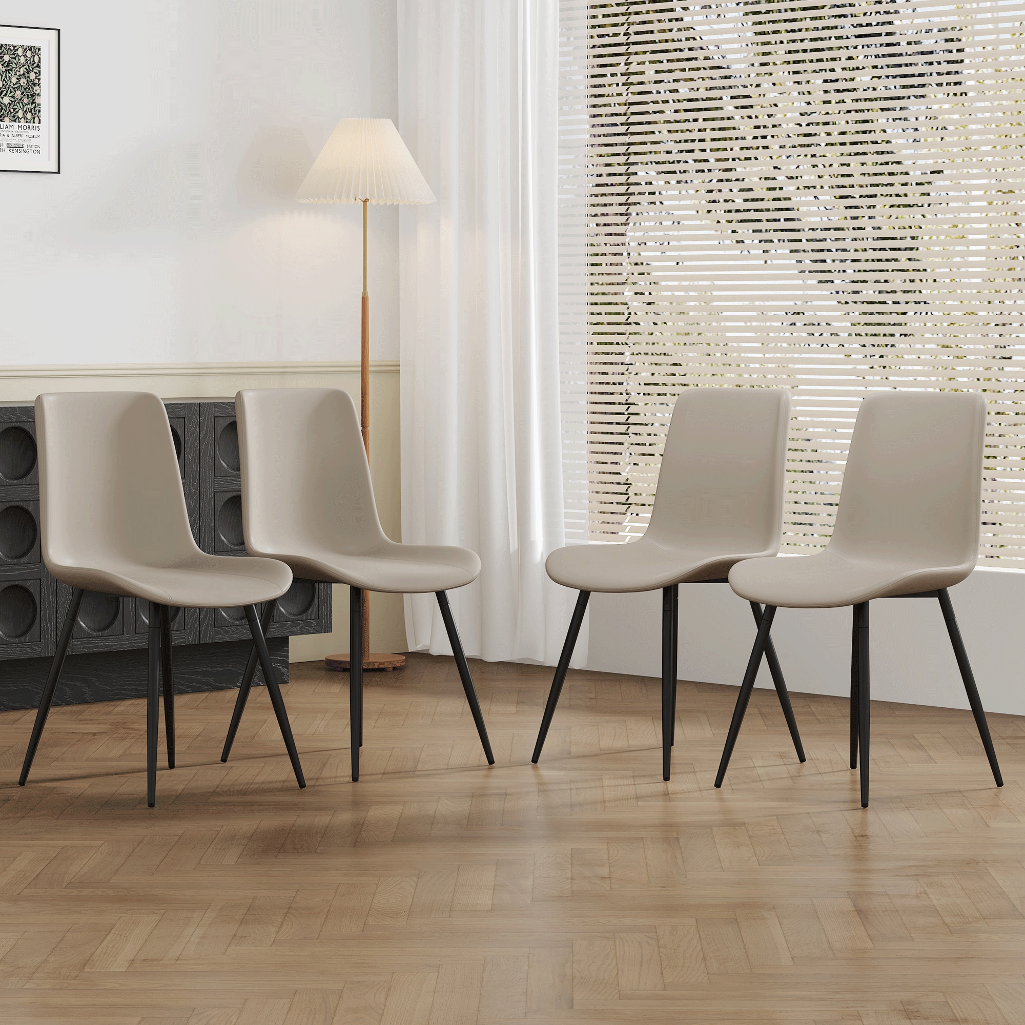 4-piece set of gray PU material dining chairs. Comfortable and durable, stable support, unique design, black metal legs. A wider seat cushion and square backrest provide additional comfort. 4-piece set of gray PU material dining chairs. Comfortable and durable, stable support, unique design, black metal legs. A wider seat cushion and square backrest provide additional comfort.