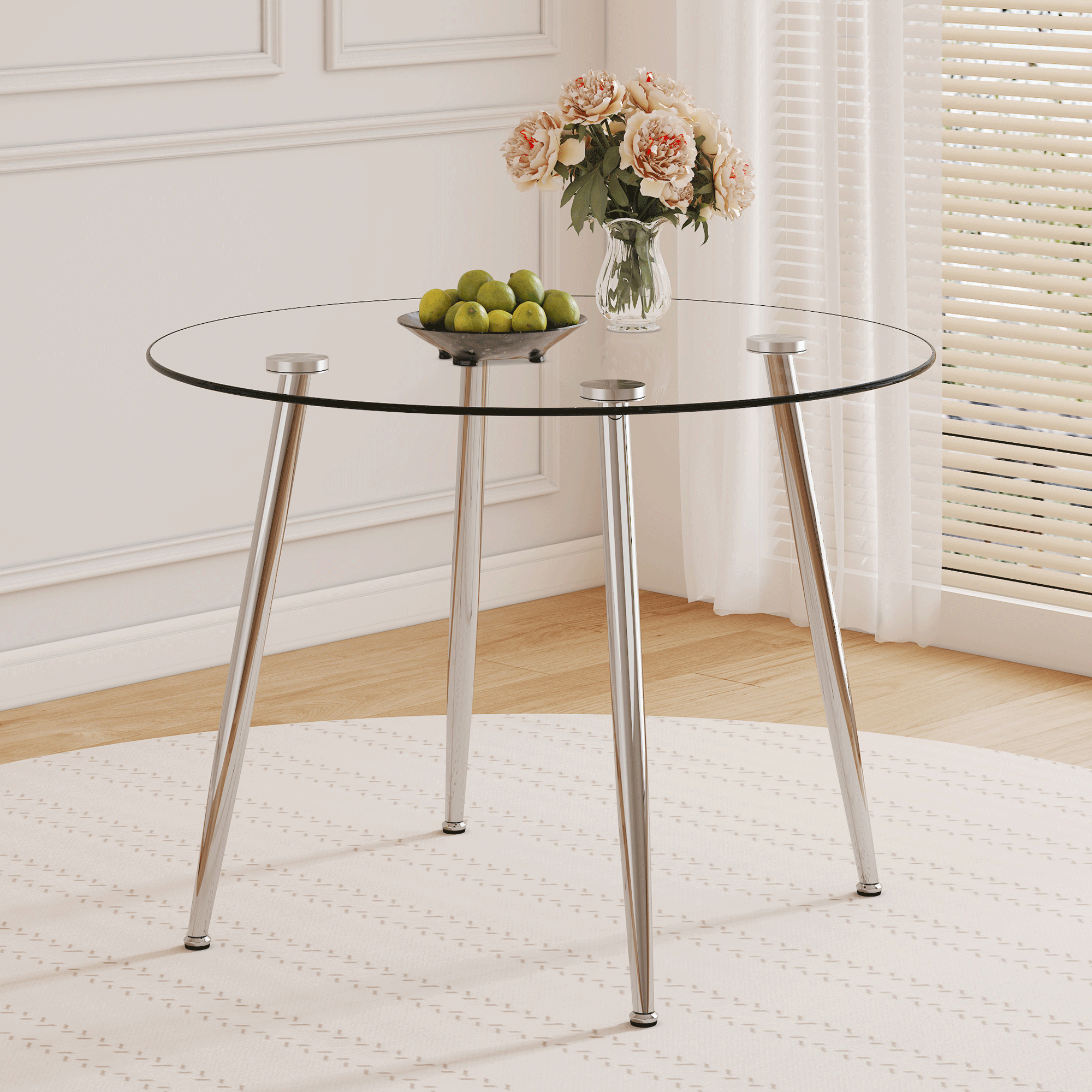 39.7-inch diameter circular dining table: transparent glass paired with silver table legs, showcasing an elegant style and fashionable restaurant furniture. 39.7-inch diameter circular dining table: transparent glass paired with silver table legs, showcasing an elegant style and fashionable restaurant furniture.